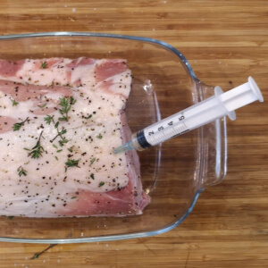 Injecting Marinade into Meat with a Syringe